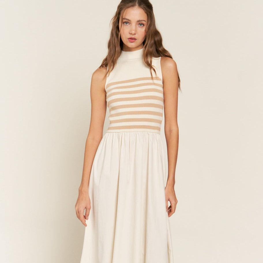 Get ready to strut your stuff in this Beige Striped Sleeveless Mock-Neck Maxi Dress. With its bold stripes and stylish mock-neck design, you'll be turning heads wherever you go. Perfect for a sunny day out or a night on the town. Express your unique style with this fun and chic dress!
Mock neckline, Sleeveless bodice, Fitted stripe top, Loose fit bottom, Maxi/ankle length dress, Self: 50% Viscose, 28%Polyester, 22% Nylon, Contrast: 100% Cotton