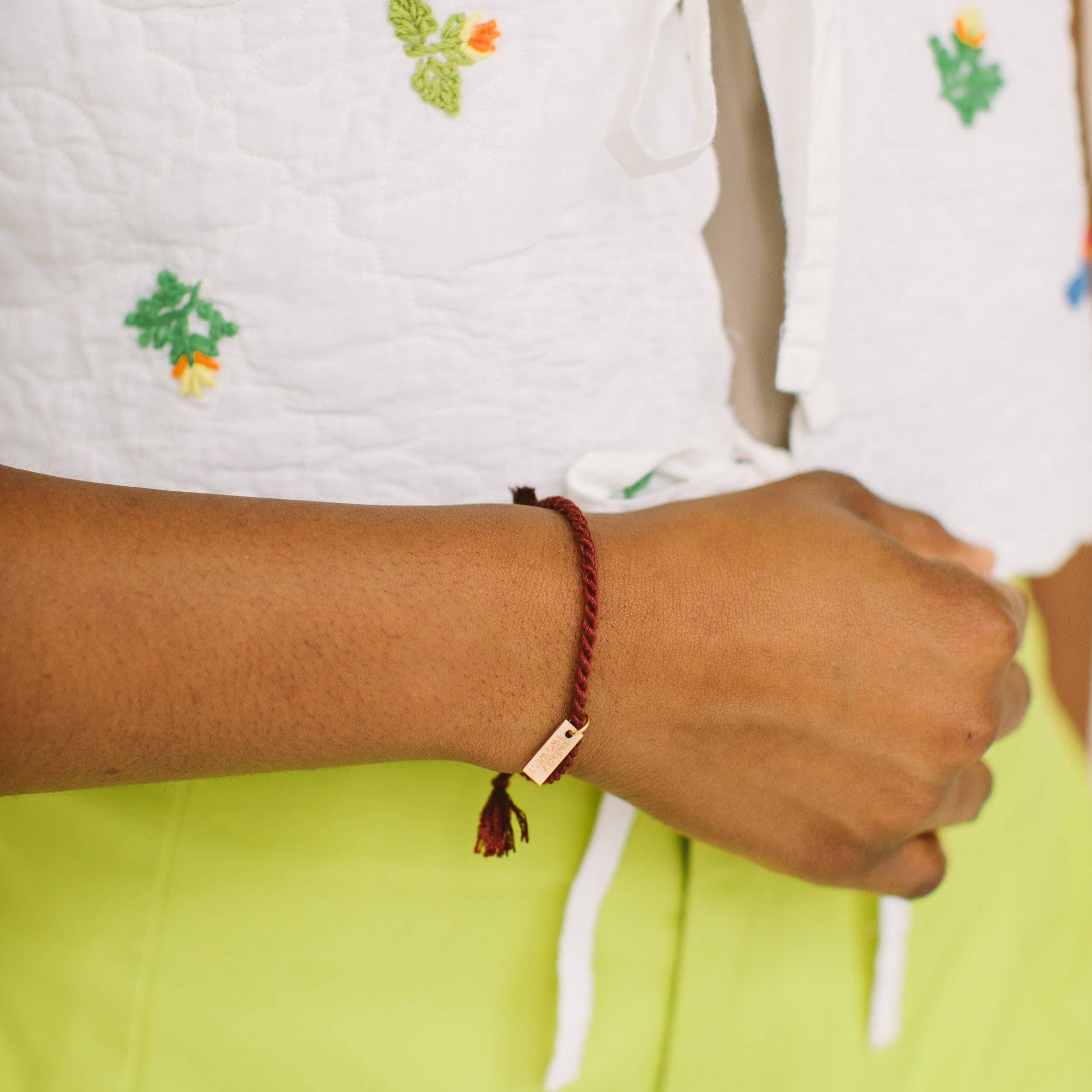 A delicate twist on Twenty Two West's crowd-favorite rope bracelets. The rope is hand spun from a single hue of cotton threads to create this soft and comfortable adjustable bracelet. Wear them individually or collect them all to mix-and-match in a complementary stack! Ink color.