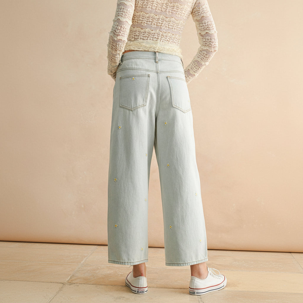 Celebrate your unique style with these Flower Embroidery Pants in classic denim. Delicate floral details add a touch of artistry to an everyday essential, creating a look that's both comfortable and expressive. Perfect for those who want to bring a little beauty into their wardrobe.
