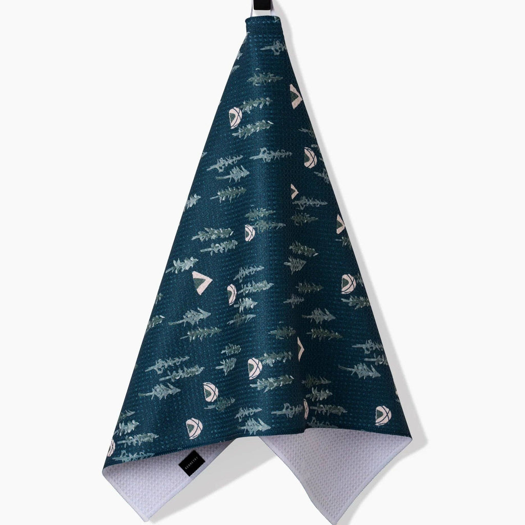 blue/green tent in forest design tea towel