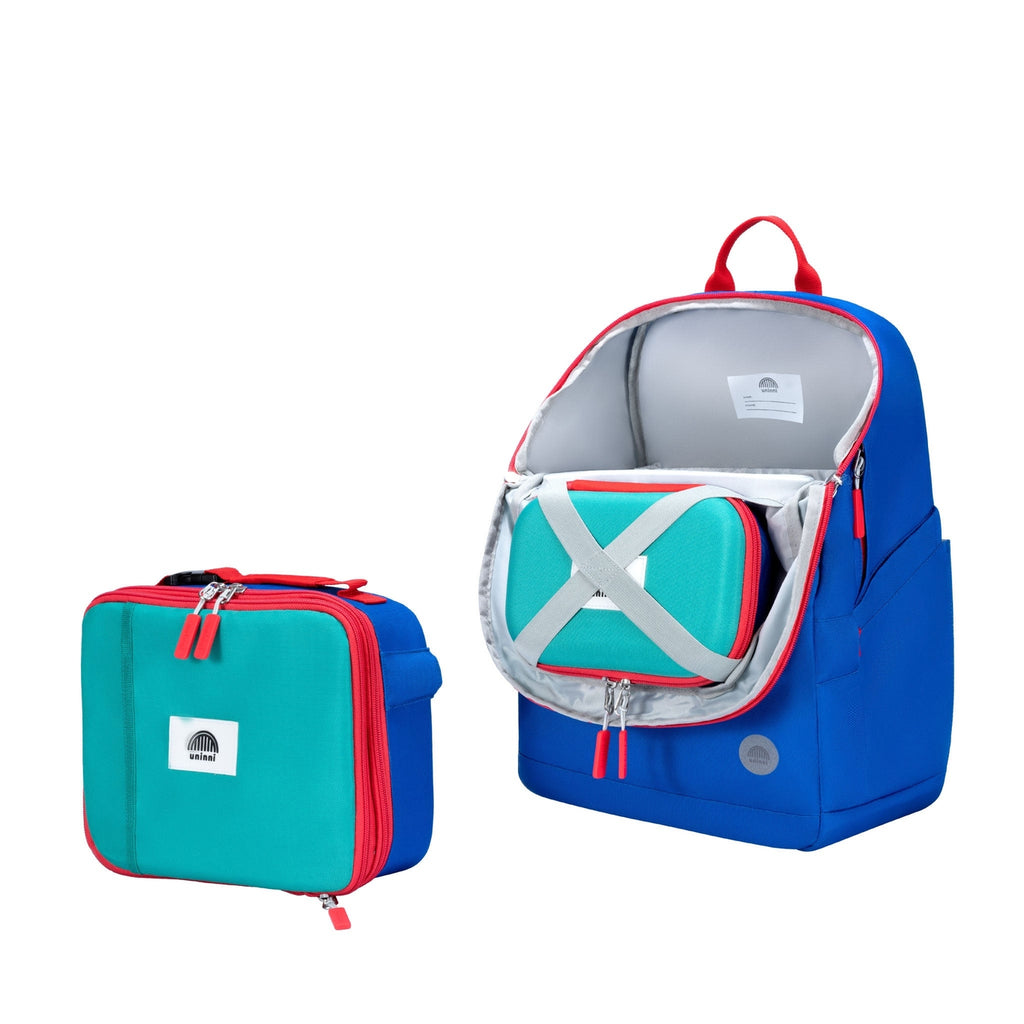 Keep your writing tools organized and stylish with the Arden Pencil Case in & Blue Color Block design. This quirky and playful case adds a touch of fun while holding all your pencils, pens, and markers in place.