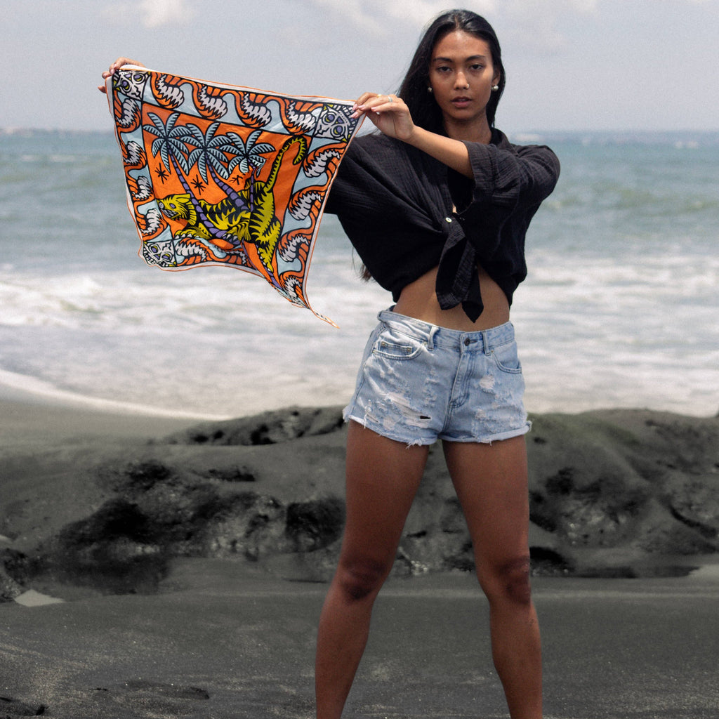 Feel the comfort of being "Trapped In" with this 100% organic cotton bandana. Made from soft and sustainable material, this bandana is perfect for everyday wear. Embrace the natural benefits of organic cotton and add a touch of quirkiness to your wardrobe.