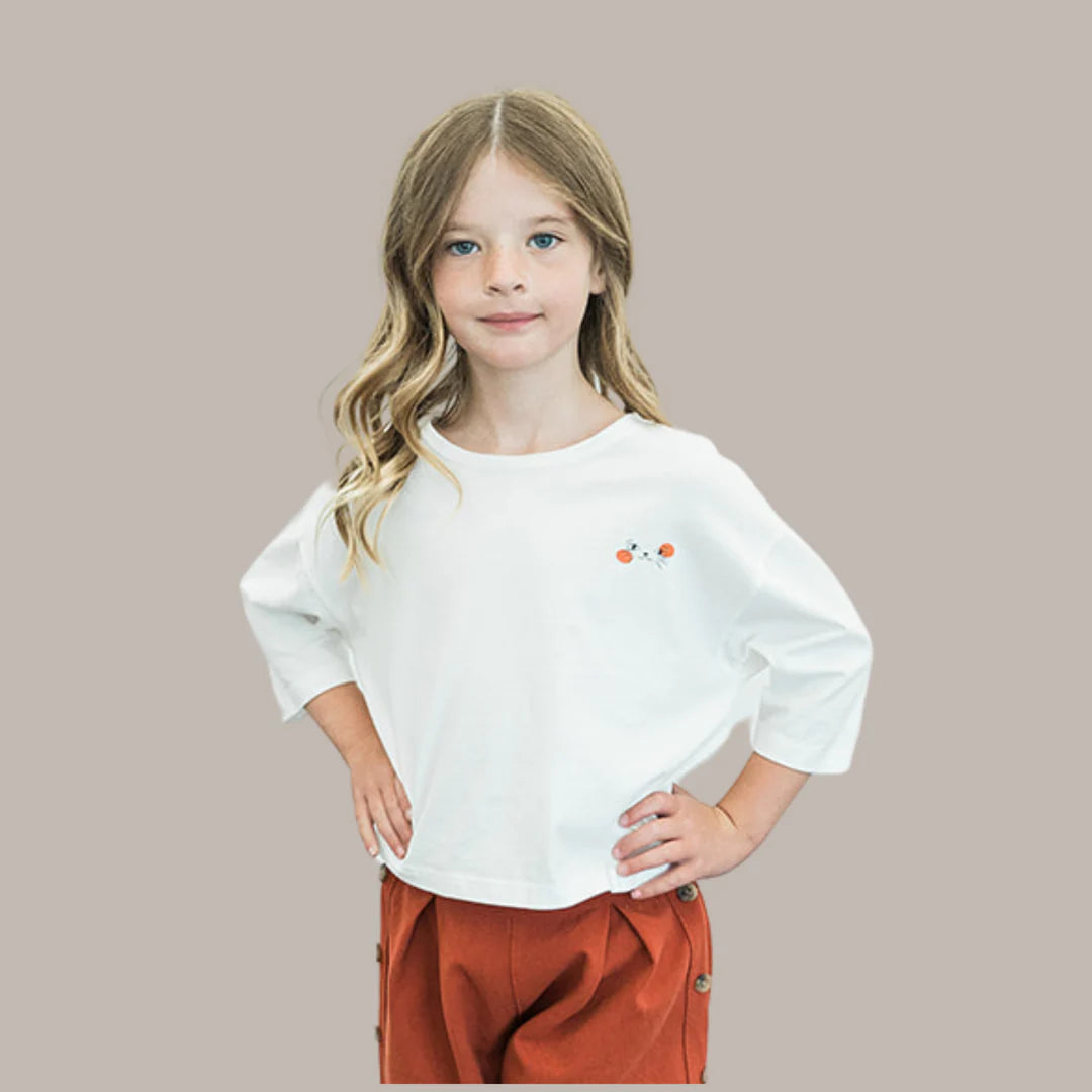 Designed for both boys and girls, this unisex shirt is the go-to piece for any occasion, be it casual hangouts, school events, or weekend fun.