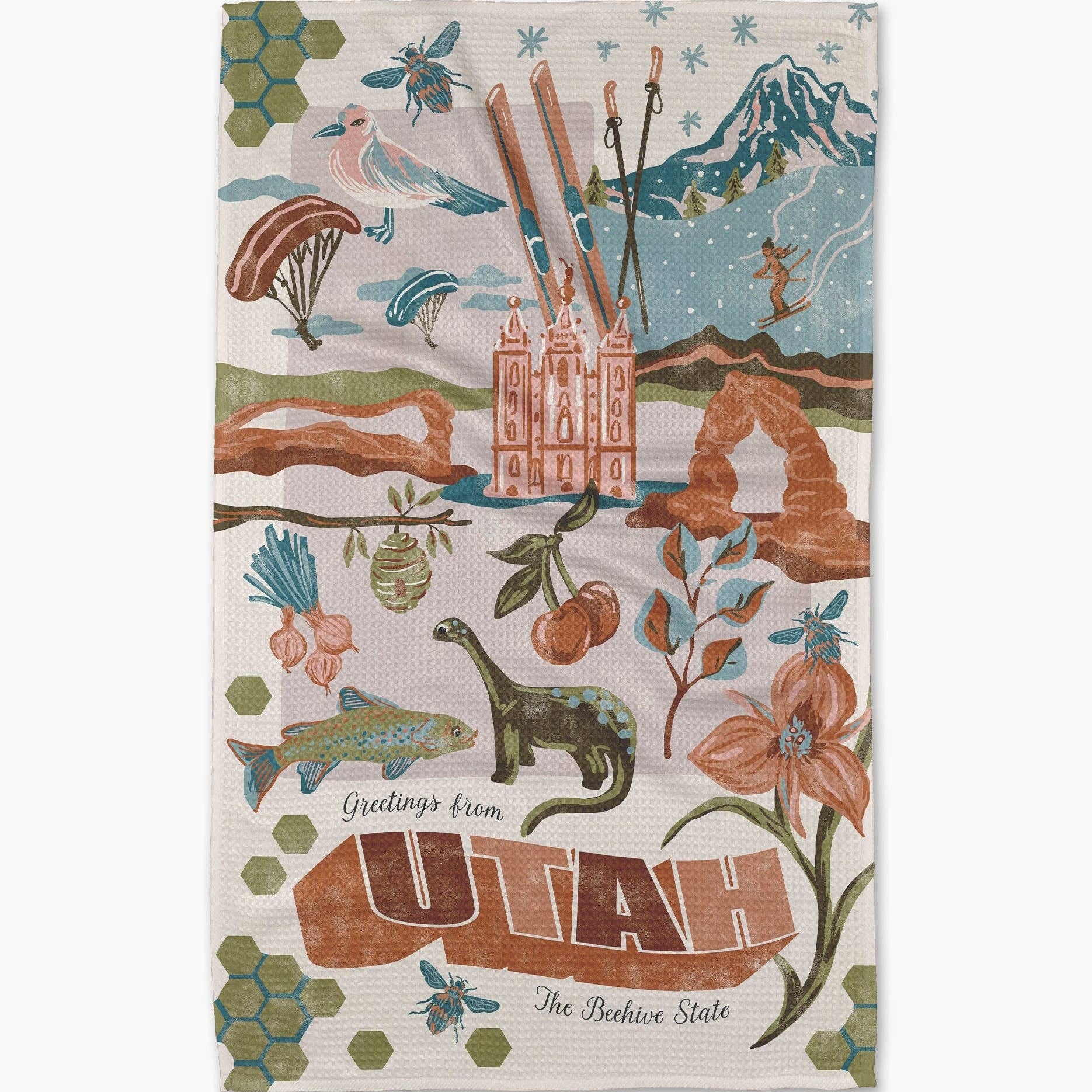 Decorative towel with Utah-themed illustrations on a white background