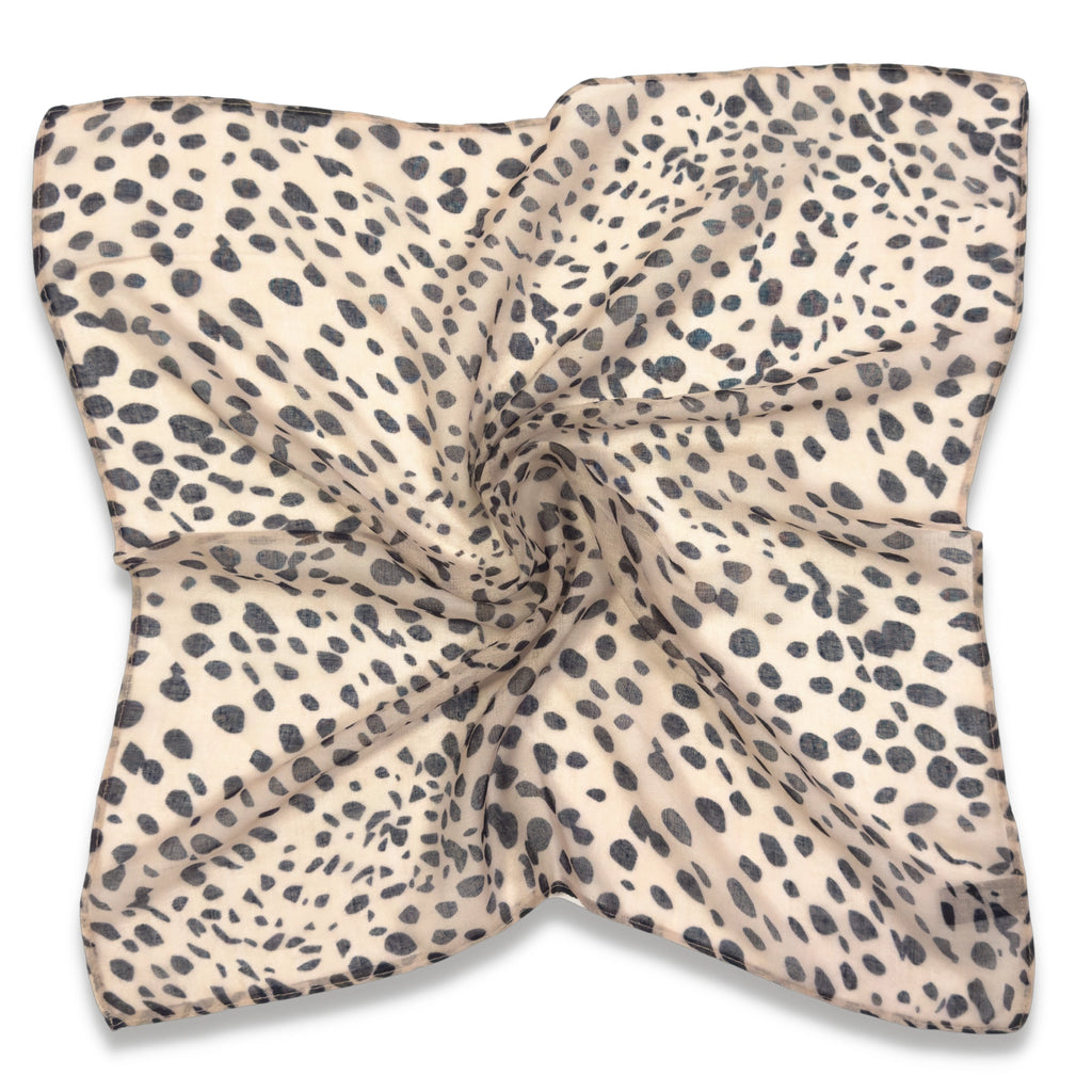 Don't just blend in—stand out with our Cheetah Bandana! Featuring a wild cheetah pattern, this chic accessory is crafted with buttery soft fabric so you can look fierce without feeling uncomfortable. Style traditionally or accessorize your braid, bun, neck, or bag! This classic hair wrap can be styled in so many trendy ways. Plus, it won't slide out of your hair like a regular ole bandana, so you can wear it all day!