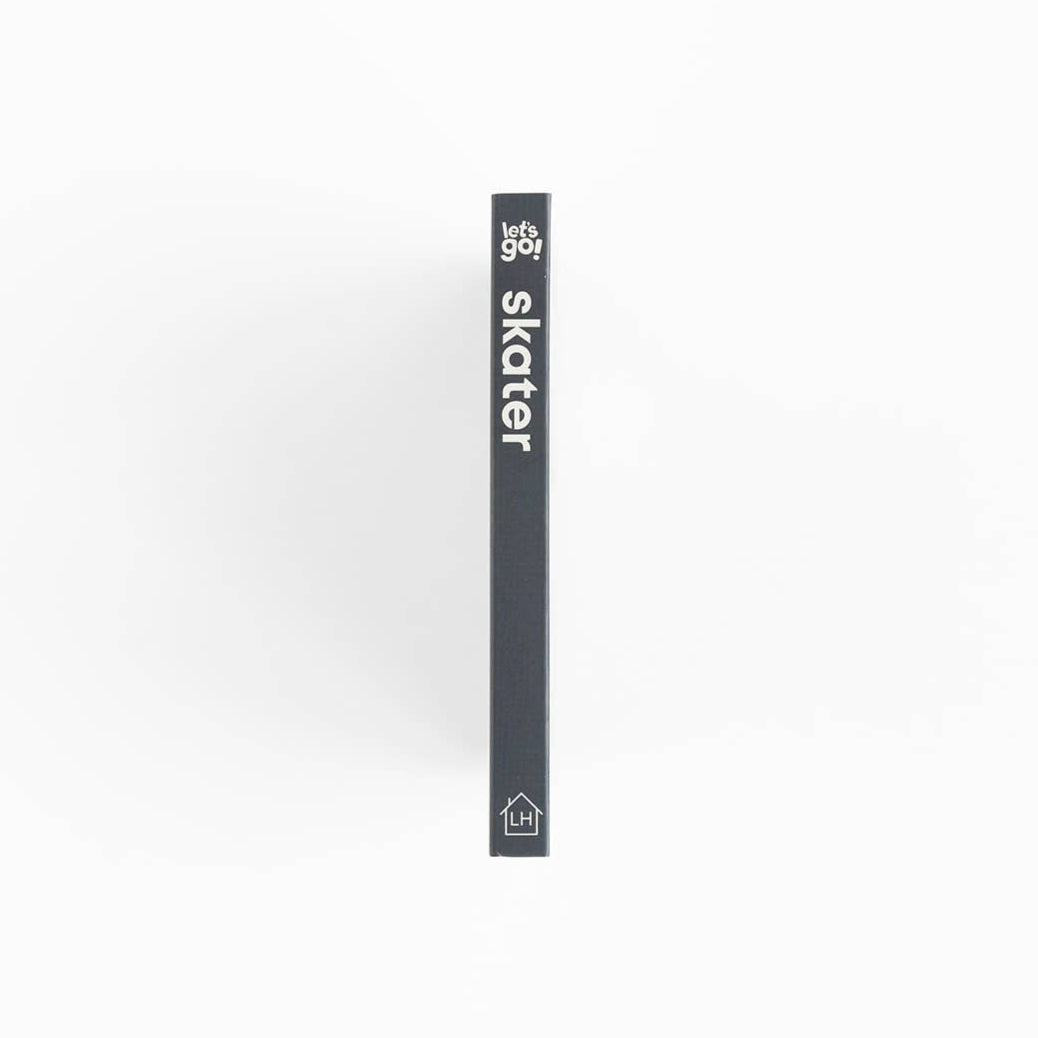 Black skateboard deck with 'skater' branding on a white background