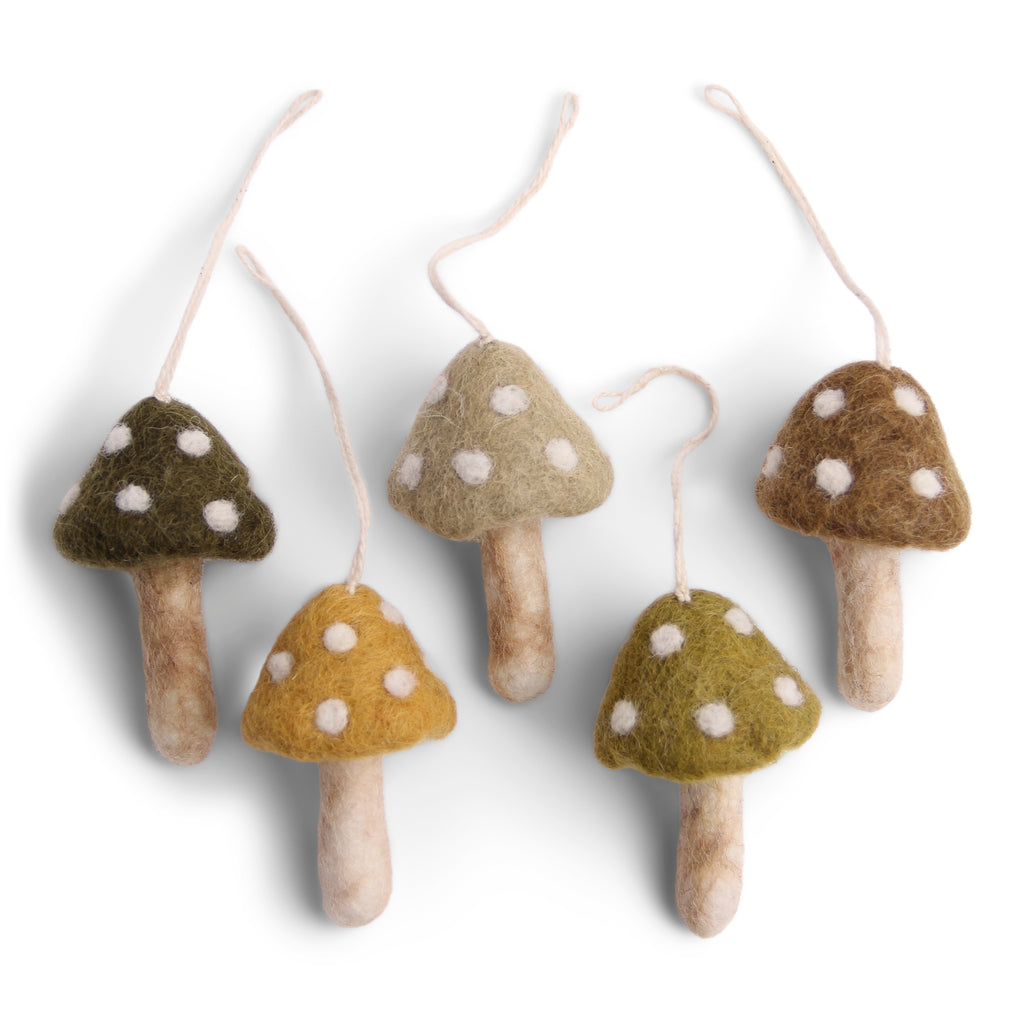 Bring a touch of pizzazz to your tree with these festive Felt Mushroom Ornaments! Available in five fun colors, these mushrooms are sure to add an extra dash of character to your holiday decoration. Perfect for a quirky Christmas celebration!     Size  2 3/8" 