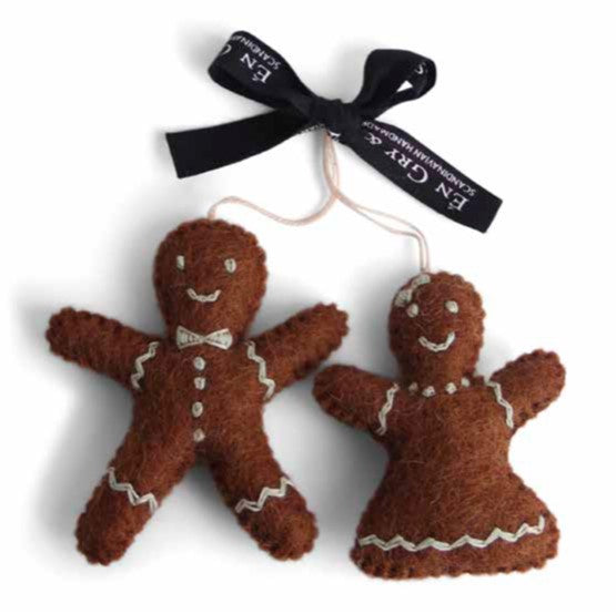 Add a pinch of cuteness to your Christmas tree this year with these adorably unique felt gingerbread ornaments! The perfect little gift (or treat) for yourself, each festive man or woman is handmade and sure to get your tree into the full holiday spirit. Yum!     Size  2 3/4" - 3"