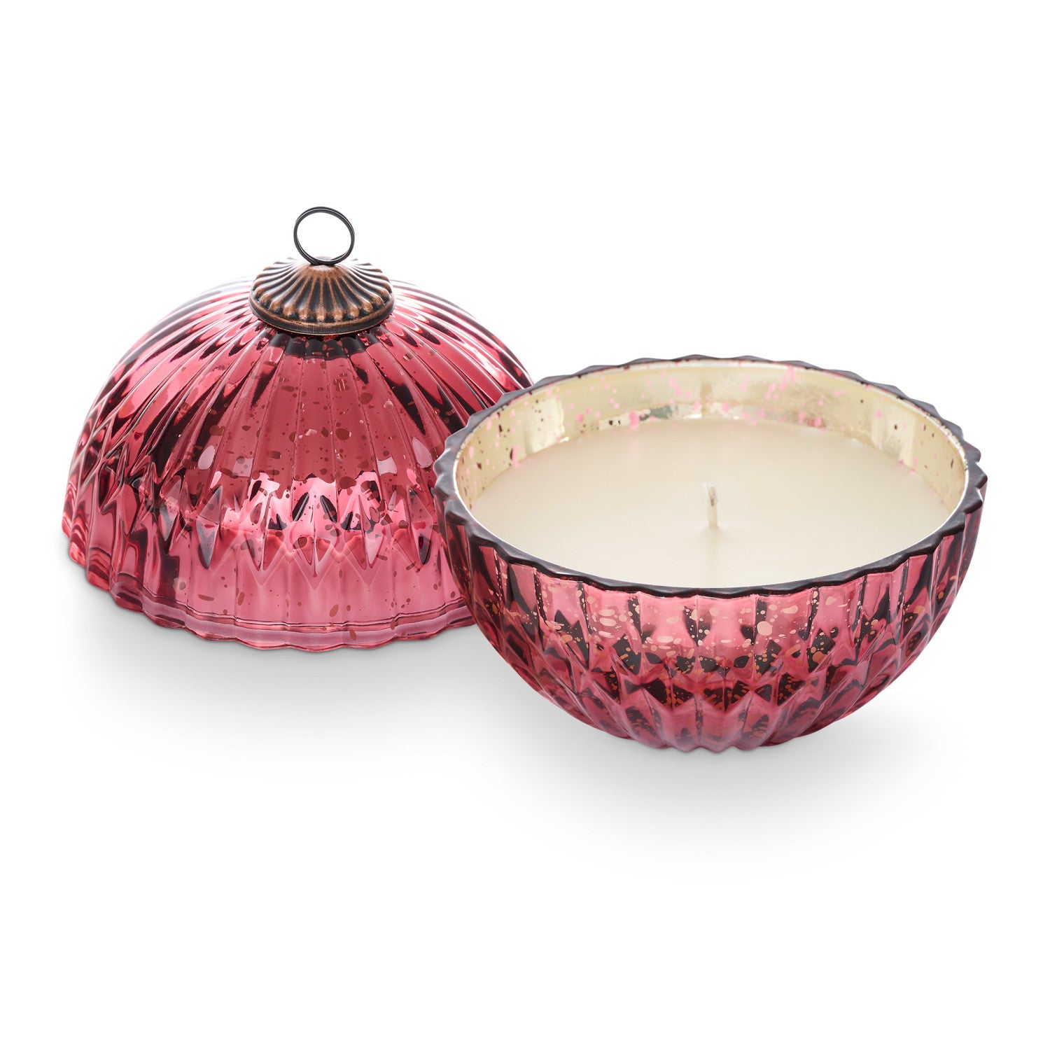 Decorative pink candle with a textured lid on a white background