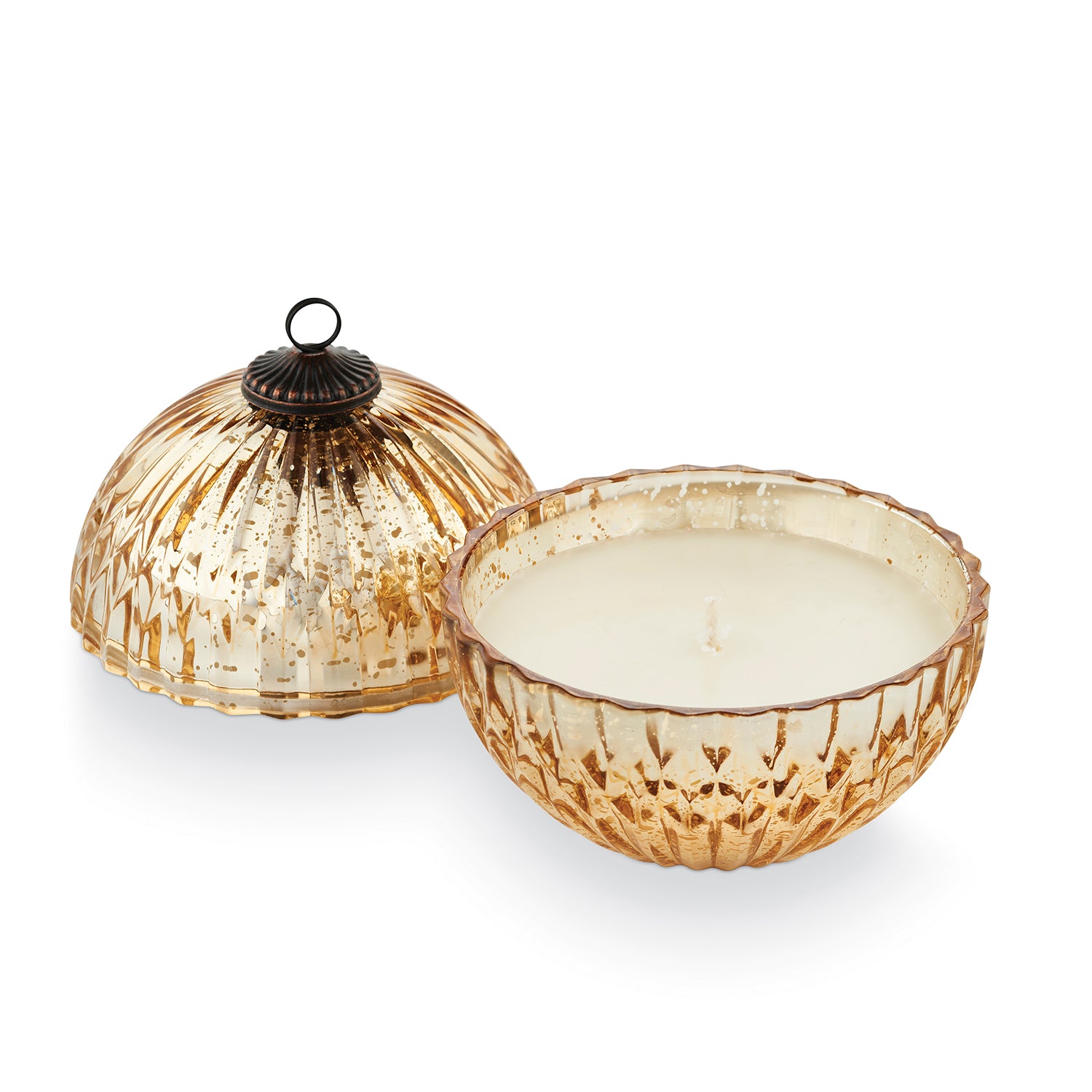 Decorative candle in a textured glass holder with a matching lid on a white background