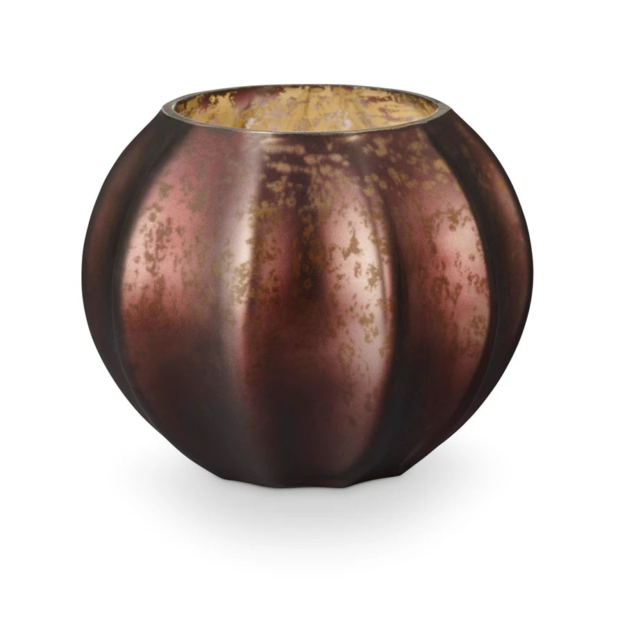 Bronze-colored decorative vase with textured surface on a white background