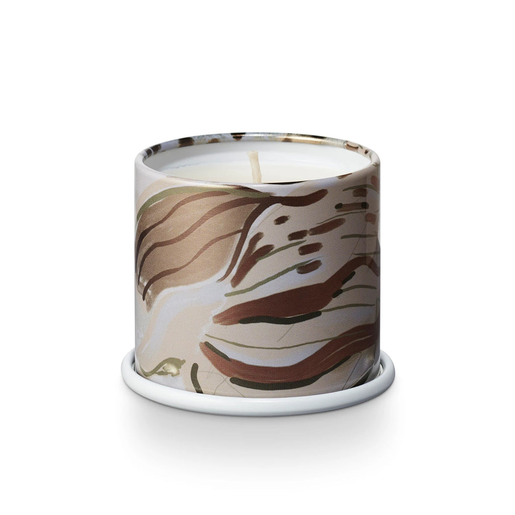 Candle. Driftwood is grounded in amber sand with a heart of citron blossom kissed with ocean mist