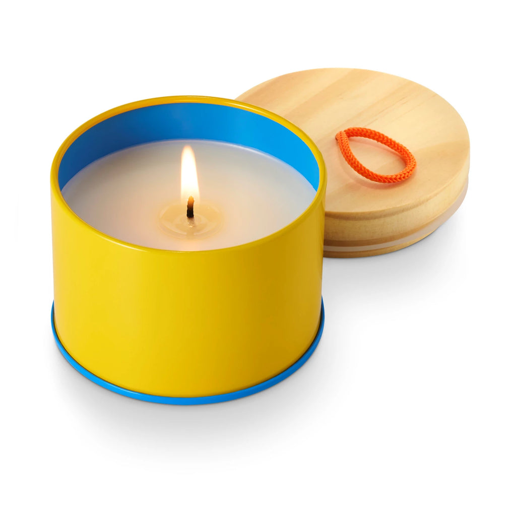 Pool Floatie Sun Tin Candle. Yellow with blue trim