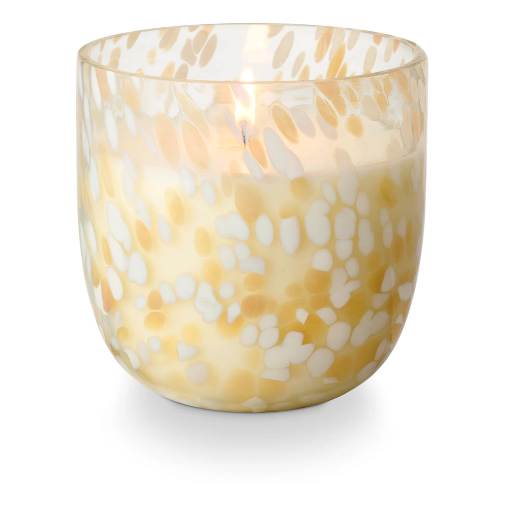 Speckled beach glass candle with a wavy, watery effect when lit. A summer lovefest of super juicy orange wedge, effervescent prosecco, and aperol spritz