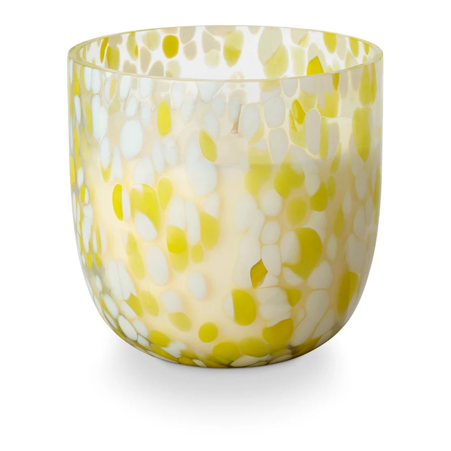 A speckled beach glass candle with a wavy, watery effect when lit. A dip in the deep end with salty pool water, a hint of sunny vinyl, and banana SPF