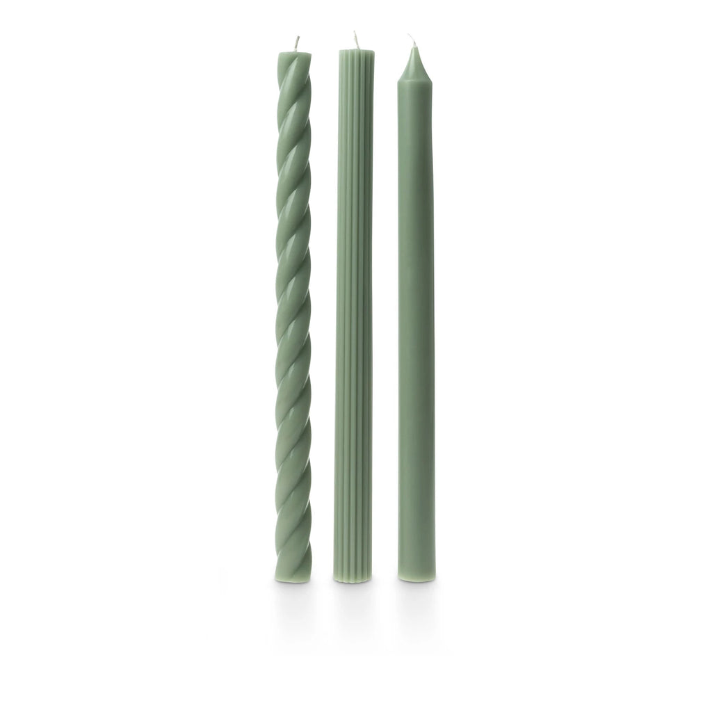 Introduce elegance and warmth into your home with our Assorted Candle Tapers 3-Pack. Each candle is unscented, allowing you to enjoy the soft glow without any overwhelming fragrances. Perfect for any occasion, these tapers will add a touch of sophistication to any space. Green 