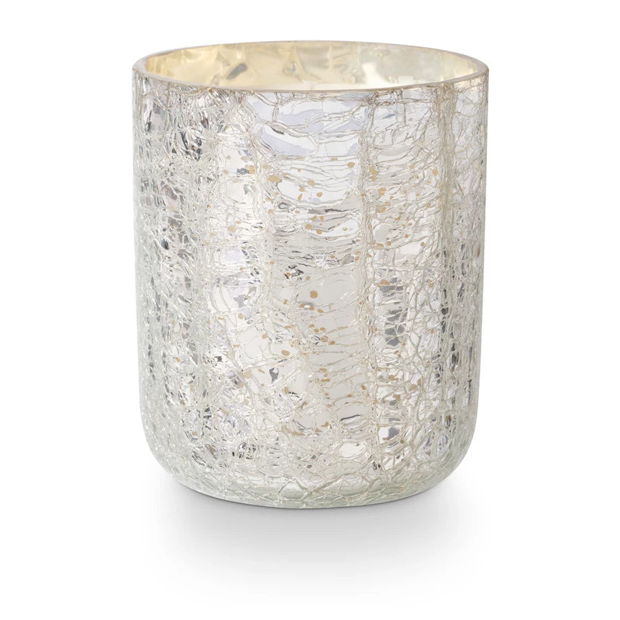 Silver textured candle holder on a white background