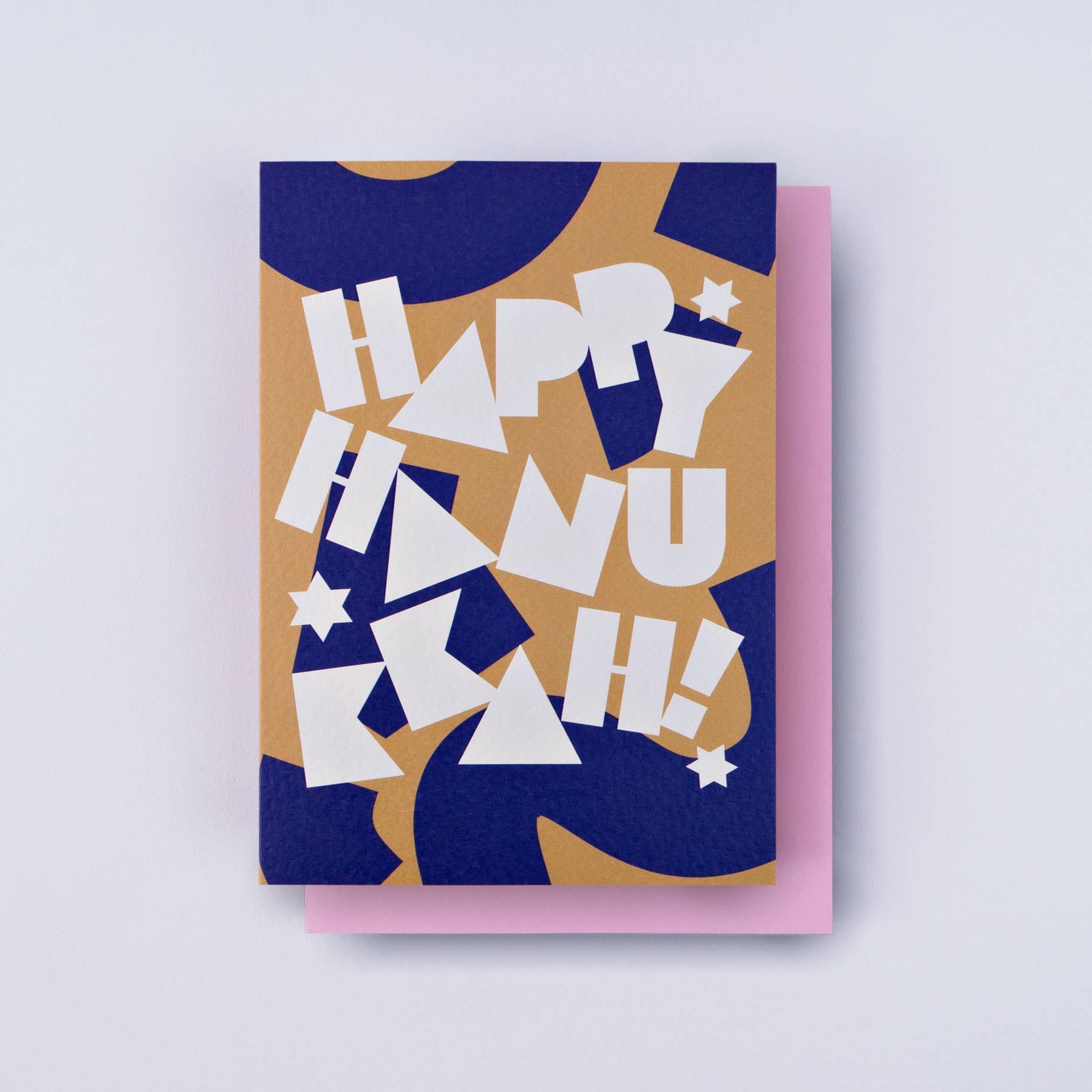 This bold Hanukkah card is blank on the inside so you can write a personalized message! It’s an A6 card, printed in the UK on 300gsm FSC certified paper. It has a hammered texture, which enhances its rich colors. Comes with a pastel pink envelope and is packed in a biodegradable bag.