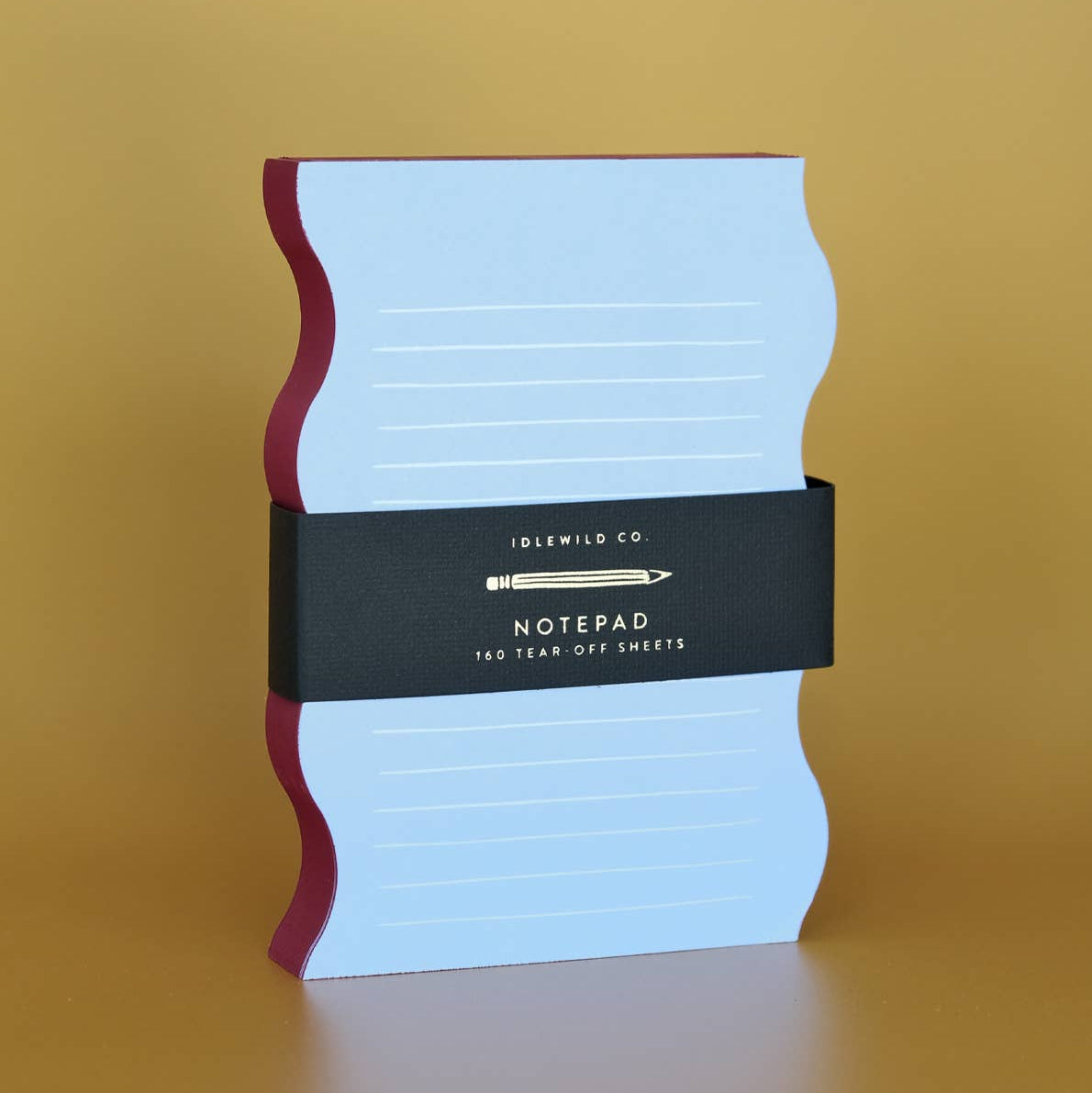 Notebook with a decorative cover on a yellow background