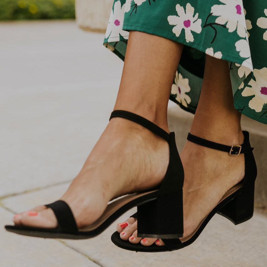 The perfect summer heels for the everyday boss babe! These faux suede heels are designed with a block heel, an ankle strap, and a strap that goes over your toes & Wear with your linen trousers, flowy skirts, or favorite dresses, these heels can bring every outfit to new heights! Black
