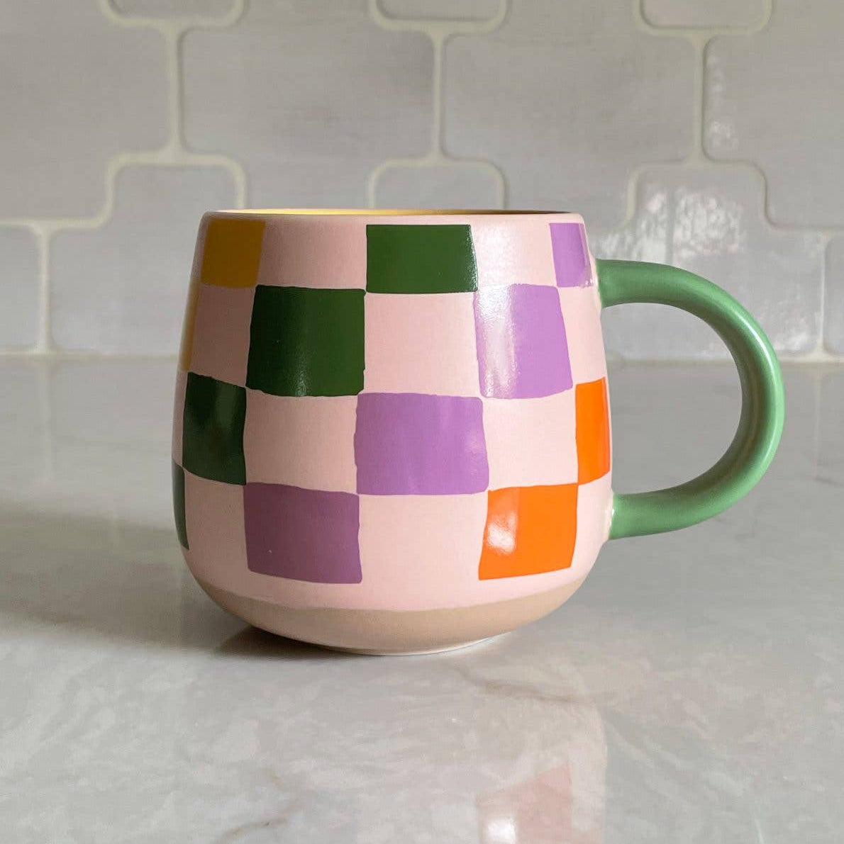 Our ceramic mugs feature our full-color, wraparound graphics on a single-walled ceramic base. We designed our vessel to be bowl shaped, keeping your drinks warm til the last drop! Coordinating handle and interior glazing keeps these as fun as they are functional- the perfect ray of sunshine to brighten your kitchen. Packaged in a pretty gift box, these make a delightful hostess or housewarming gift.

• 13.5OZ | 400ML

• Dishwasher safe/Microwave Safe - Hand Wash For Maximum Longevity