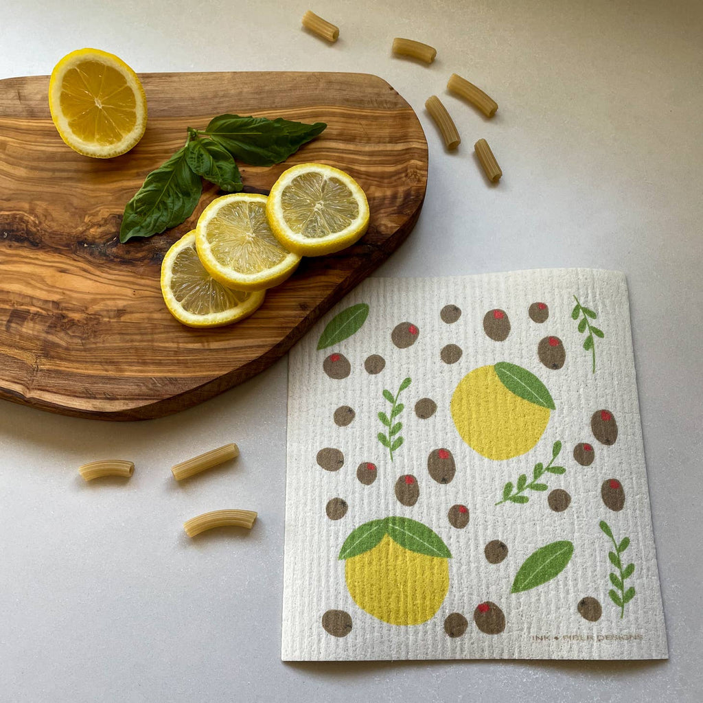 Say goodbye to soggy, smelly dishcloths! This Swedish Dishcloth is here to save the day. Made from innovative Swedish material, it absorbs 20x its weight and dries quickly, keeping your kitchen clean and fresh. Plus with its quirky design, dish duty just got a whole lot more fun!  Olive and Lemon      Measures  7x7.5 inches  Material  70% cellulose 30% cotton. 