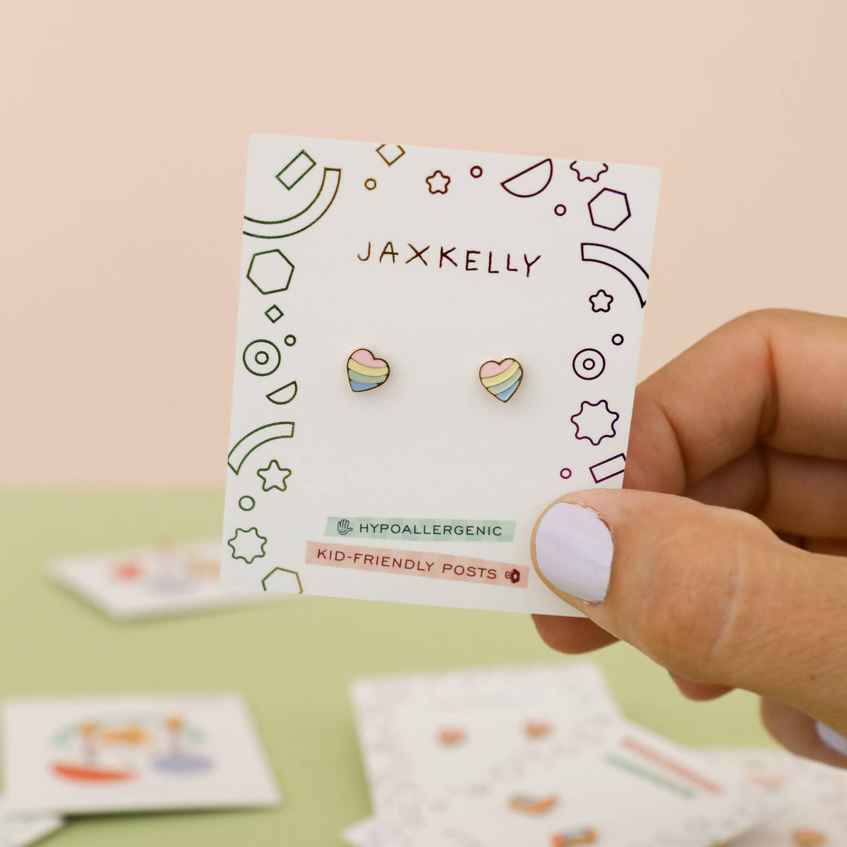High-quality, hypoallergenic earrings are made for kids with sensitive ears and can be worn 24/7. Designed for kids but cute enough for grown-ups too!

Details:

Post Length: 10mm
Post Size: 20 gauge, .8mm
Flat screw back
Waterproof and can be worn in the pool and bath
Poke-free back
Surgical grade stainless steel
18K gold plated
Lead, copper & nickel free
Enamel