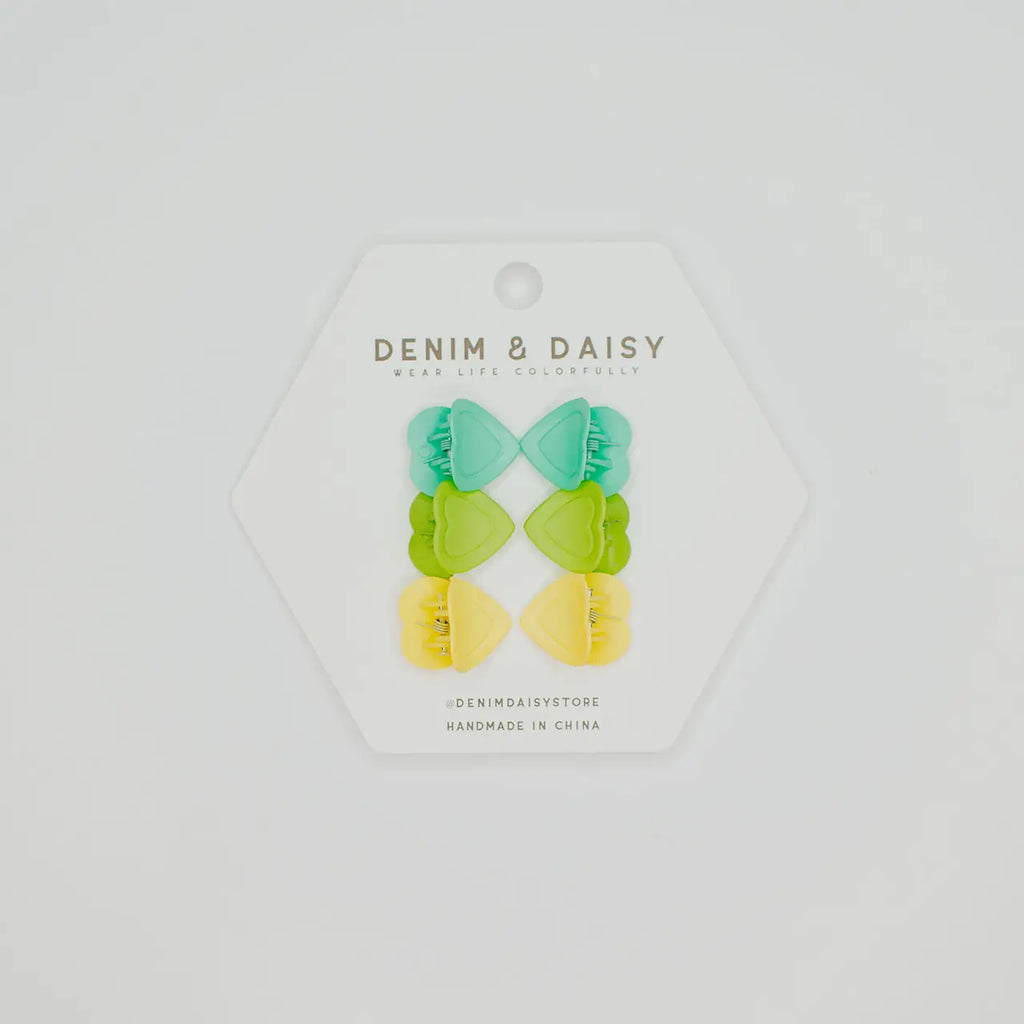 The cutest, tiniest, mini-est, little matte heart hair claws from Denim &amp; Daisy. Each set comes with 3 different colors: Blue, Green & Yellow