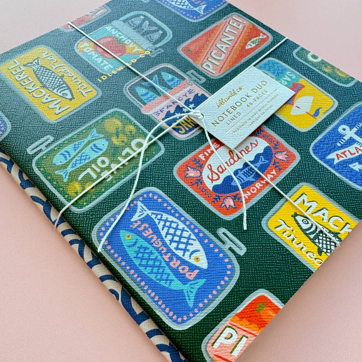 Packaged product with colorful labels on a green background