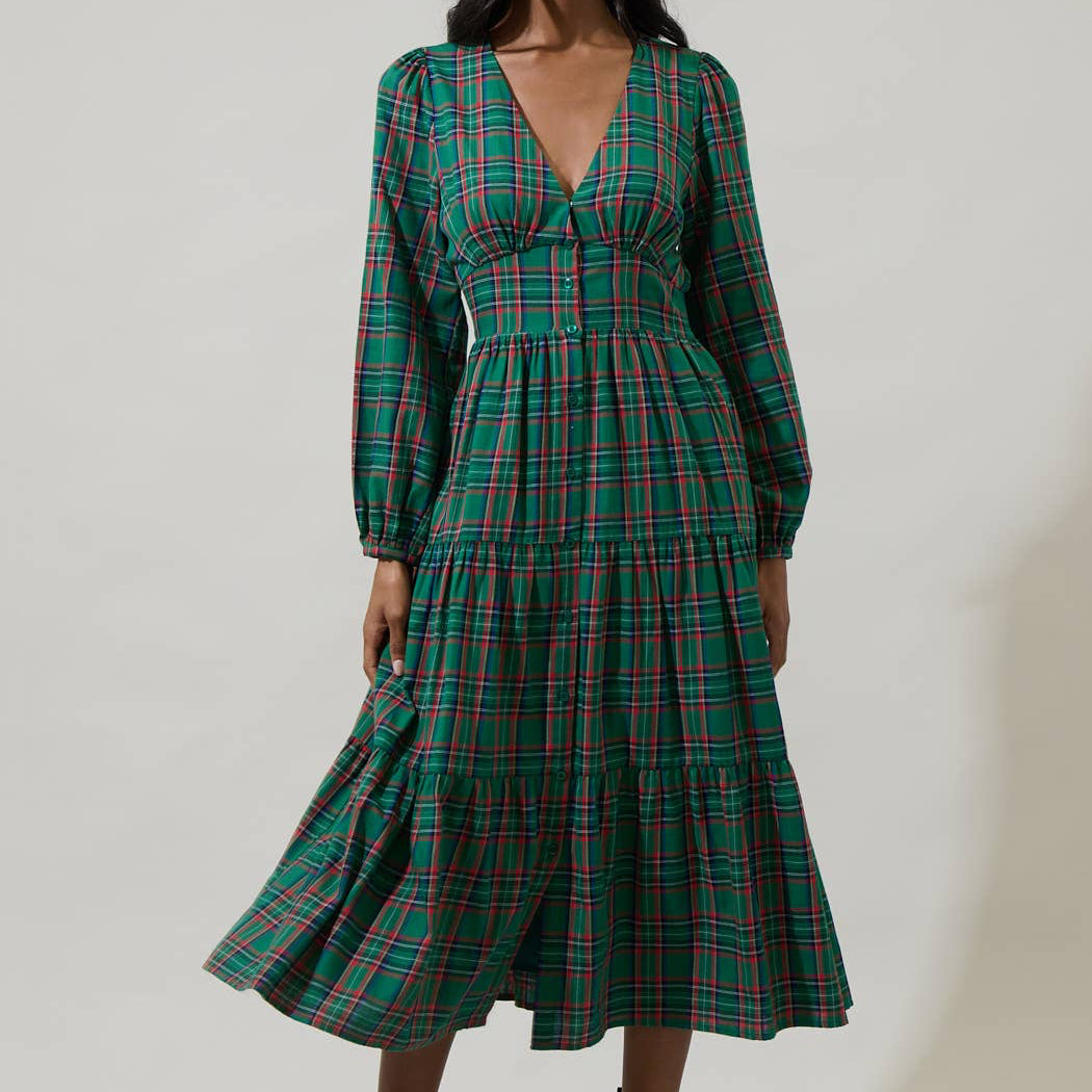 Enter fall season with great looks, including the Jace Plaid Shely Button Down Midi Dress. Long sleeves with elastic cuffs, frame a v neckline with a button-down placket all the way down to the midi length. This tiered dress will look extra cute with short boots or heels.

Details:

Plaid
Midi
Balloon long sleeves
Tiered
Model is 5'9" and wearing size XS
Measurements taken from size S - Chest: 17" - Length: 49"