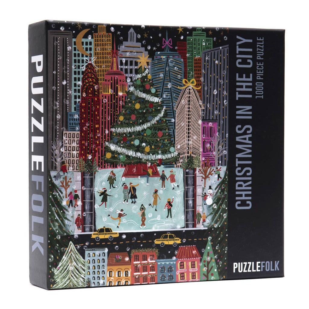 The magic of Christmas in the City truly comes to life as you immerse yourself in this beautiful puzzle.     Product Info  1000 piece puzzle  Finished puzzle dimensions  20" x 27"  Box dimensions  9" x 9" x 2"