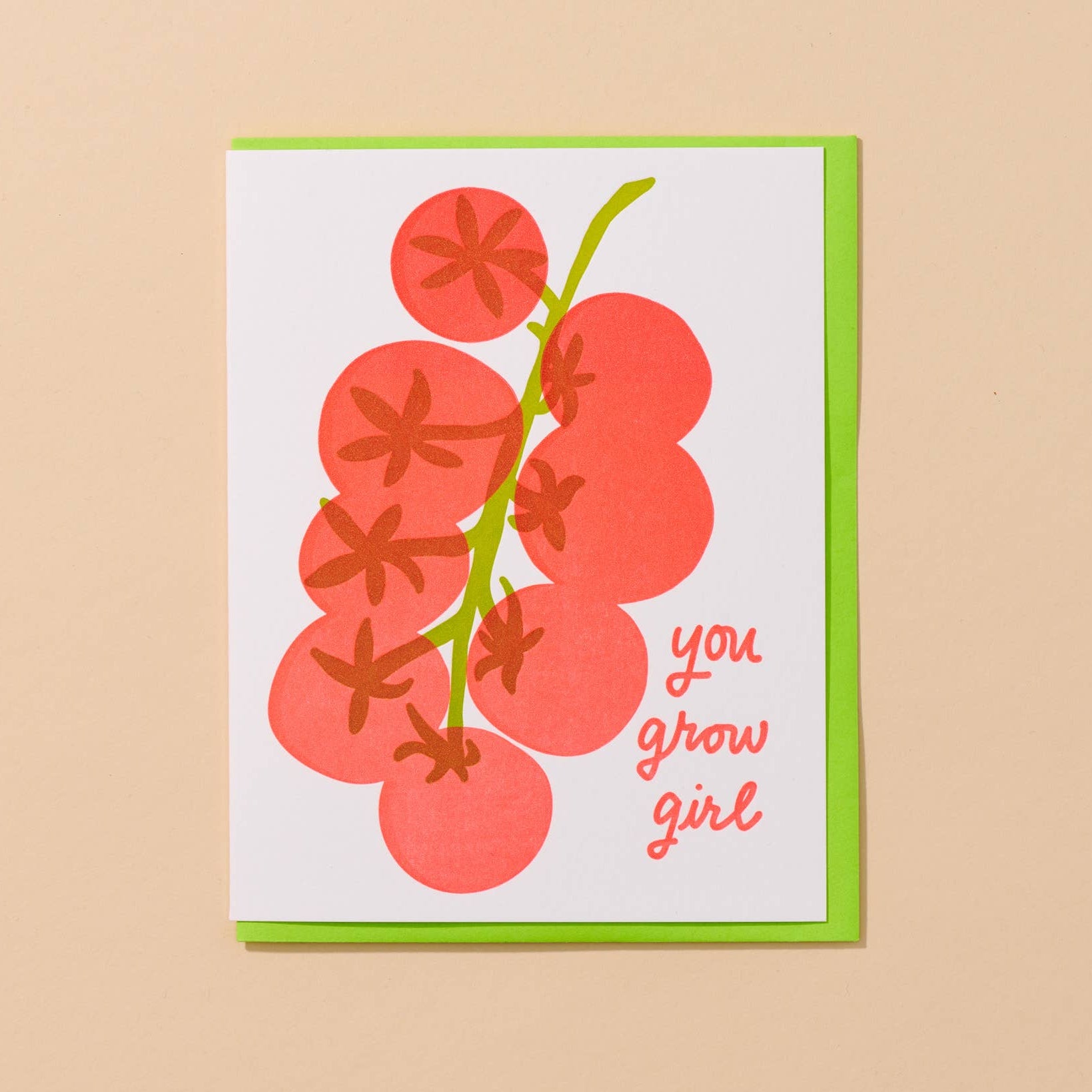 Card with red tomato illustration and 'you grow girl' text on a beige background