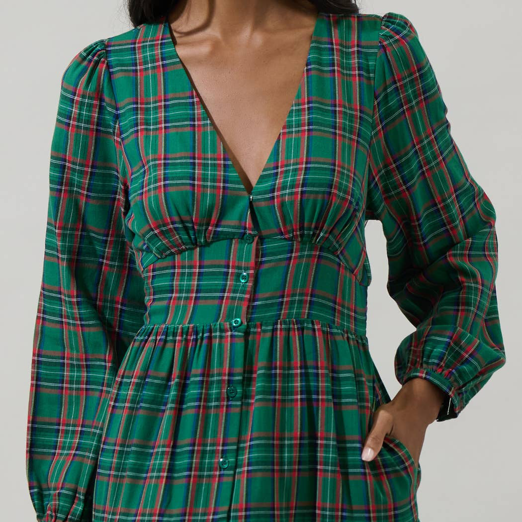 Enter fall season with great looks, including the Jace Plaid Shely Button Down Midi Dress. Long sleeves with elastic cuffs, frame a v neckline with a button-down placket all the way down to the midi length. This tiered dress will look extra cute with short boots or heels.

Details:

Plaid
Midi
Balloon long sleeves
Tiered
Model is 5'9" and wearing size XS
Measurements taken from size S - Chest: 17" - Length: 49"