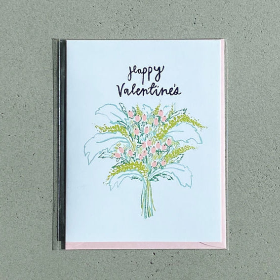 white card reading "happy valentine's" with a pink and green bouquet