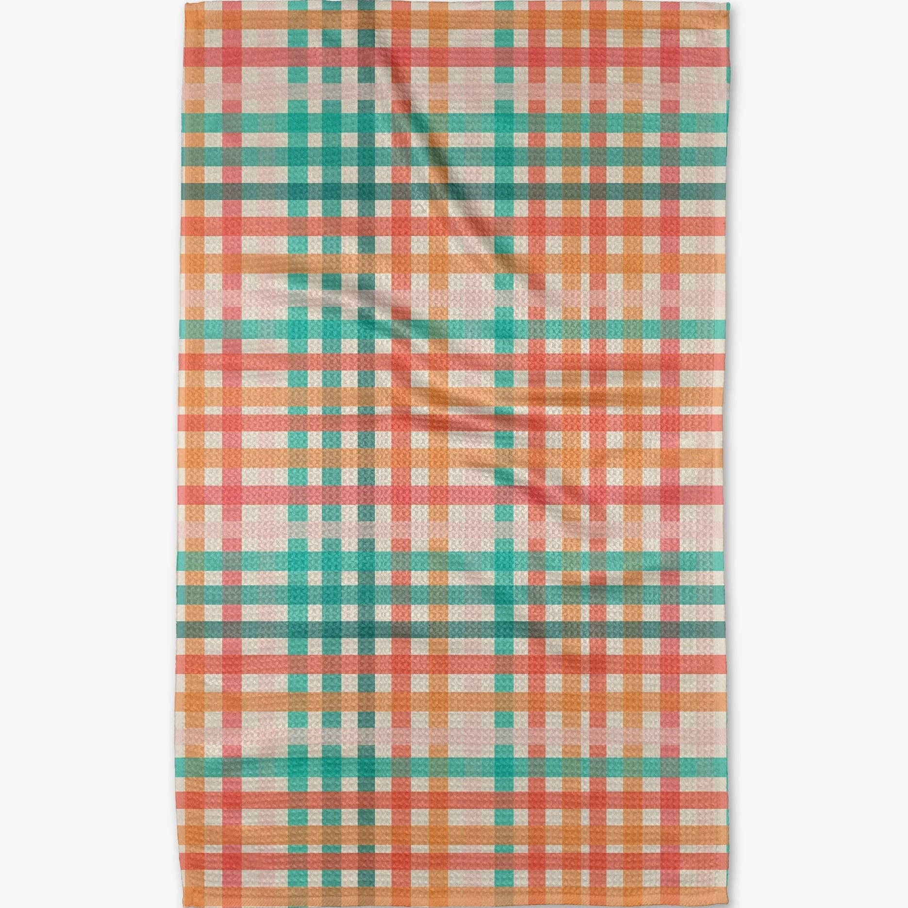 Plaid fabric with orange, green, pink and white pattern on a white background