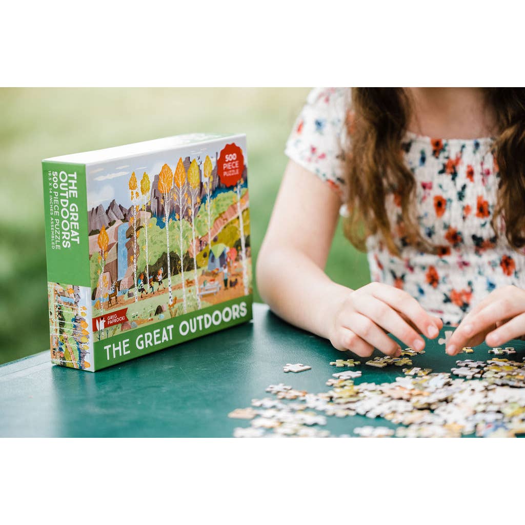 Gather ‘round as a family, invigorate your brains and brighten your day with this 500-piece jigsaw puzzle using art from the insanely popular books illustrated by Greg Paprocki.