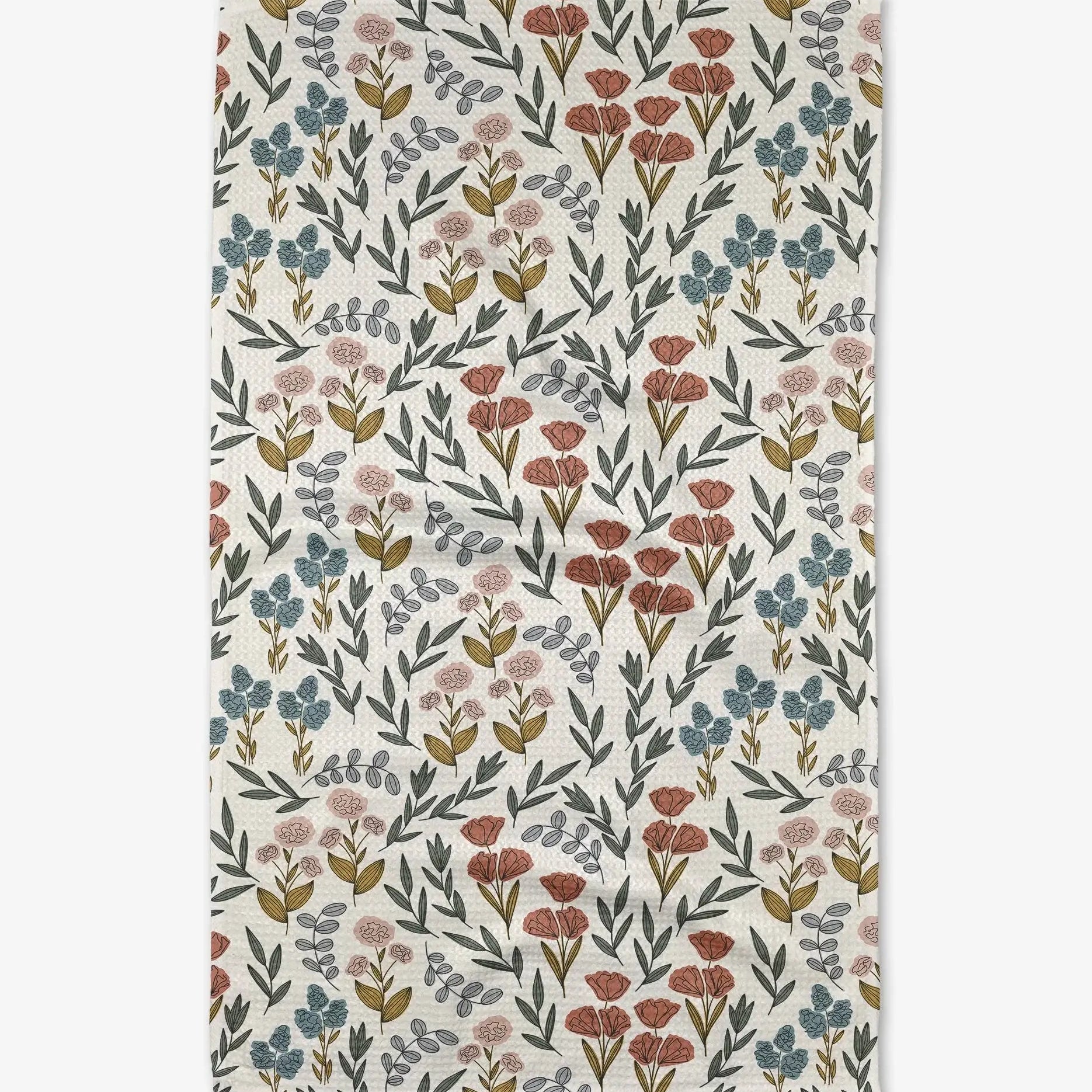 Floral patterned towel with small flowers on a white background