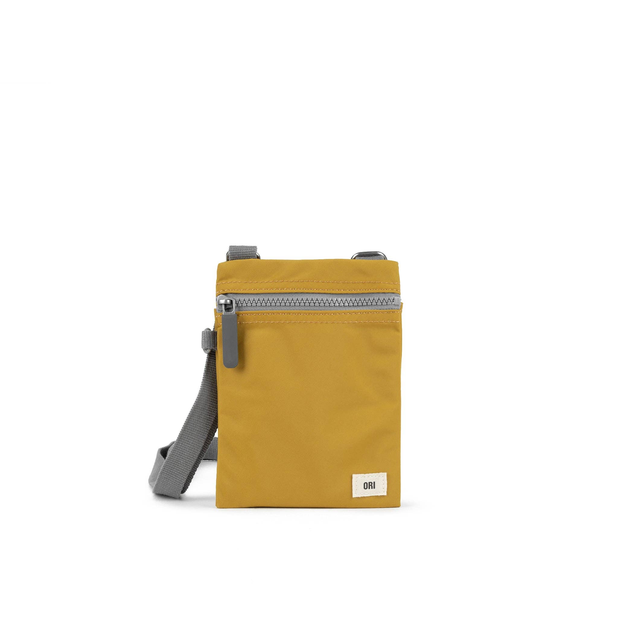 Our hands-free extra pocket is always by your side. The Chelsea is our great little crossbody pocket to keep those special things close and safe. Corn

Give your phone, card and essentials their very own stylish way to be carried whilst you are on the move. Our brand-new Chelsea collection is the perfect lightweight, urban accessory for you to travel light and always be on the move.

Made from recycled material, the Chelsea has been designed to keep your mobile phone, cards, and valuables close by.