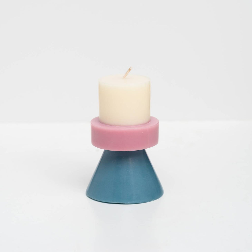 The colors of these stack candles have been carefully chosen to create a playful combination. All of the candles are individually hand poured by skilled fair trade artisans layer by layer to form the multi colored effect.     Color  Ivory / Lavender / Blue grey