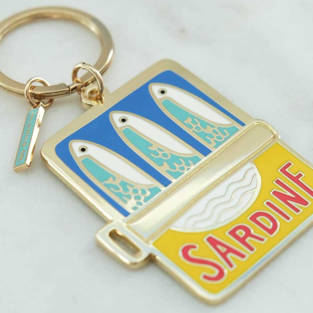Our brass and enamel keychains make for an eye-catching accessory, perfect for finding those keys at the bottom of your bag! Created from our hand painted designs, they're fabricated with vibrant, hard-enamel and polished to a shine. We offer them in a pretty, plastic-free gift box, or opt in to our unboxed option for a reduced cost.

• Brass and Enamel Keychain

• Charm Measures Approx. 1.75 X 2″