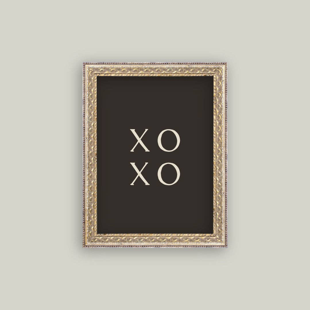 Bring timeless elegance into your space with this charming vintage-inspired framed art piece. Featuring an ornate black frame that exudes classic sophistication, this 12x16 print showcases delicate XOXO detailing against a striking black background. The antique aesthetic adds warmth and character to any room, whether displayed in a bedroom, living area, or gallery wall. Perfect for those who appreciate nostalgic design with a modern sensibility.