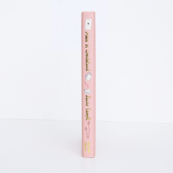 Pink lip balm with branding on a white background