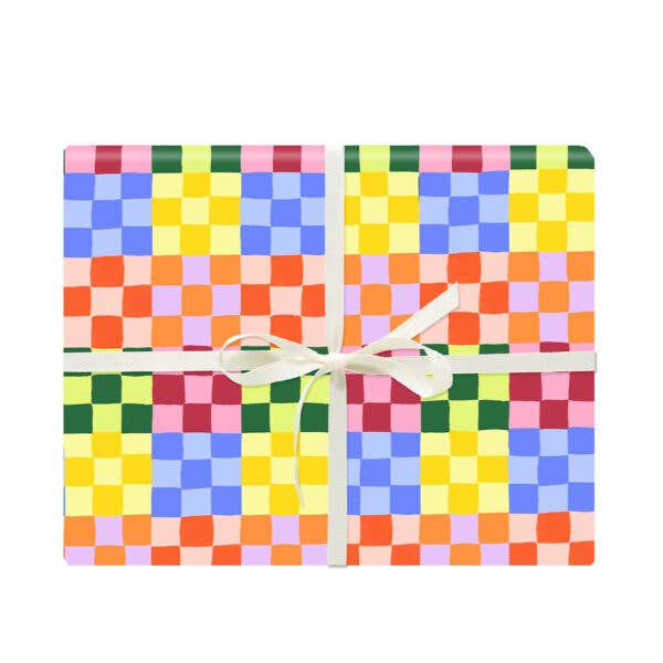 Colorful checkered box with a white ribbon on a white background