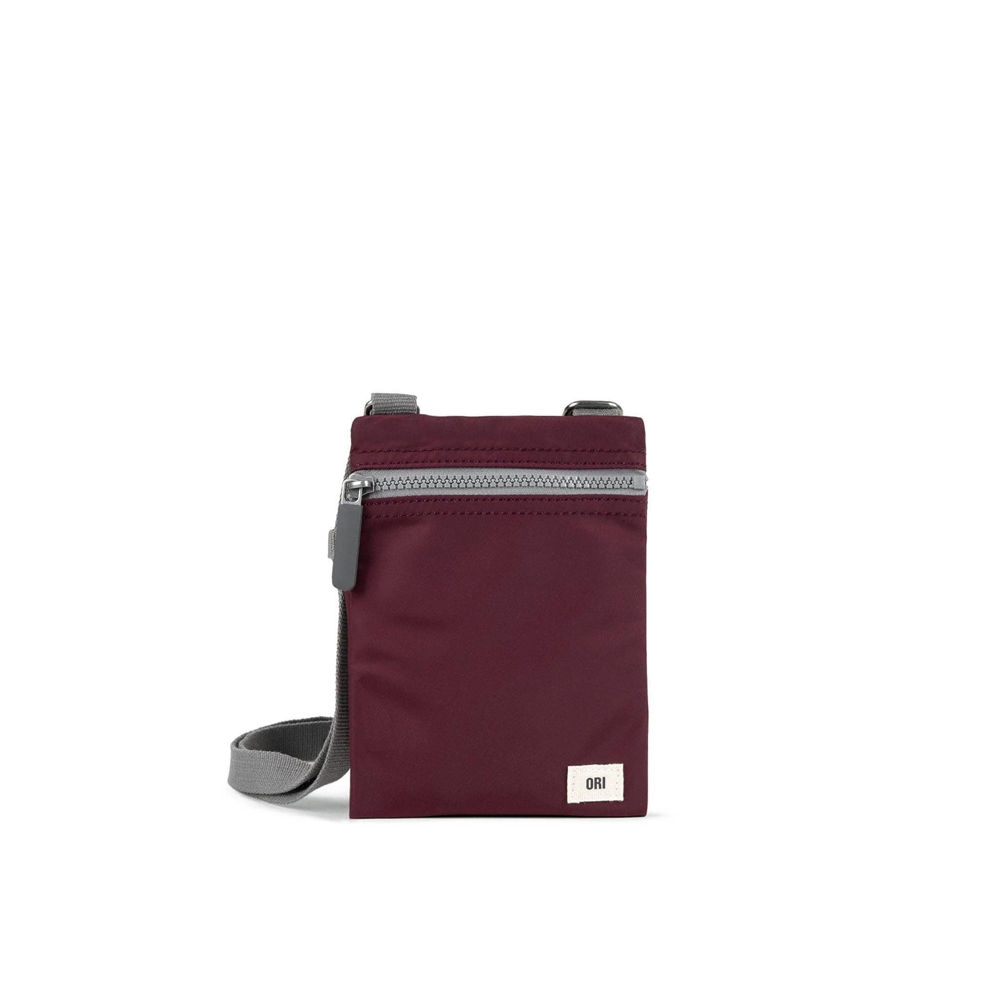 Our hands-free extra pocket is always by your side. The Chelsea is our great little crossbody pocket to keep those special things close and safe. Plum

Give your phone, card and essentials their very own stylish way to be carried whilst you are on the move. Our brand-new Chelsea collection is the perfect lightweight, urban accessory for you to travel light and always be on the move.

Made from recycled material, the Chelsea has been designed to keep your mobile phone, cards, and valuables close by. 
