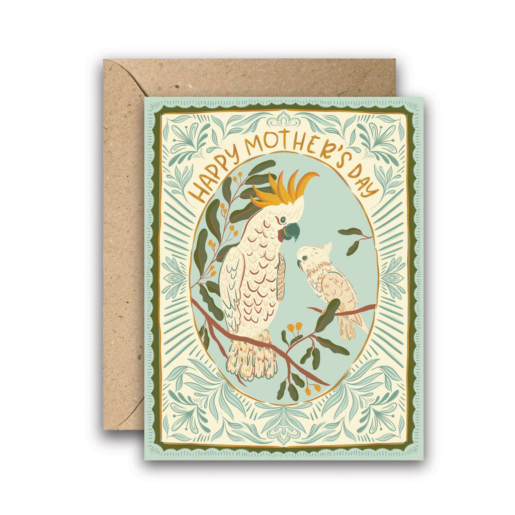 Dive into the tender world of maternal affection with Amicreative's "Cockatoo Love Mother's Day Card," a charming addition for shop owners looking to enchant their customers this Mother’s Day. This card, radiating warmth and care, features a heartwarming illustration of a mother cockatoo tenderly watching over her baby, encased in a blue and green scalloped frame adorned with intricate floral details. 
