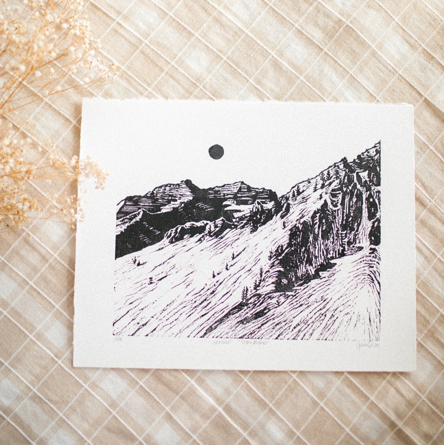 hand carved and pressed black and white 11x14 print of snowbird