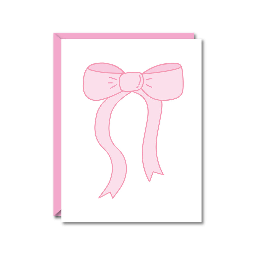 white card with a pink bow