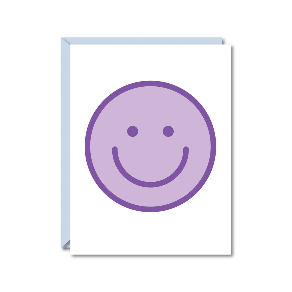 white card with a purple smiley face