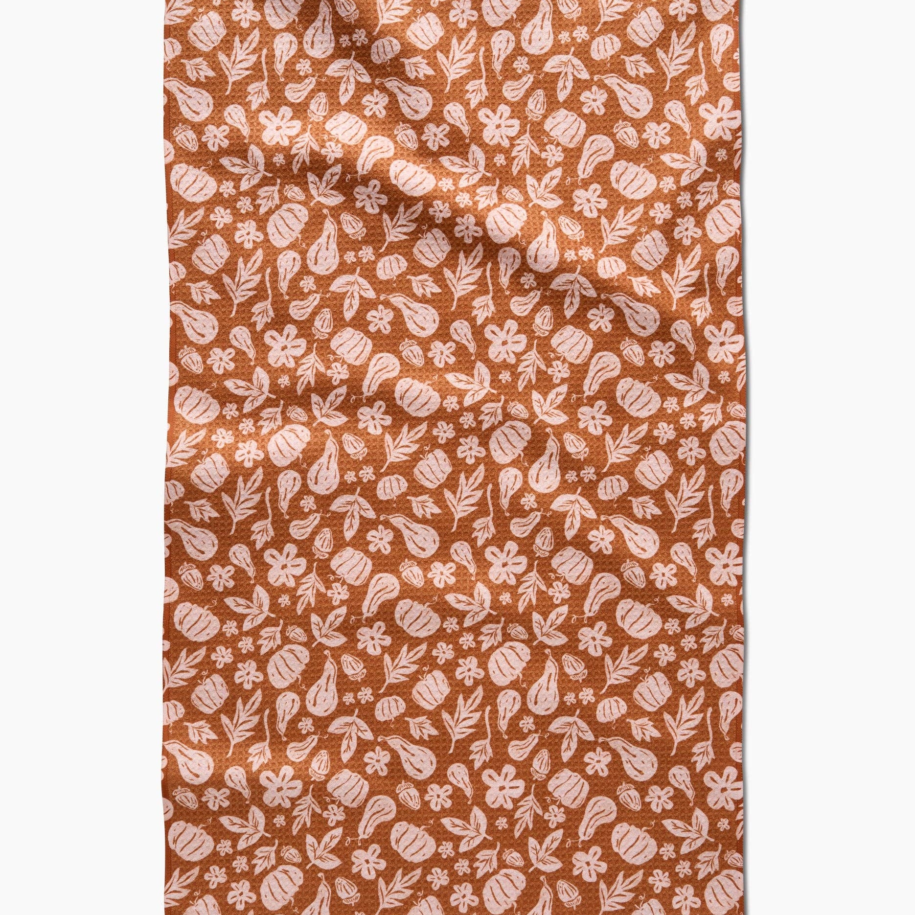 Pink and orange floral patterned fabric on a white background