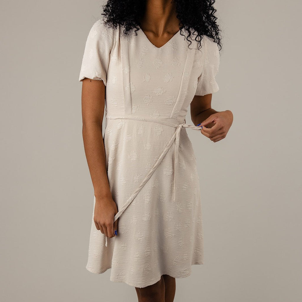 I feel like I should be writing a full-length love letter to this dress. It has everything: a v-neckline, puff sleeves, a waist tie. What more could you want? And shout out to all you mommas out there: it's got hidden nursing zippers!!